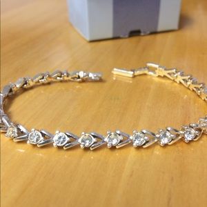Avon silvertone tennis bracelet